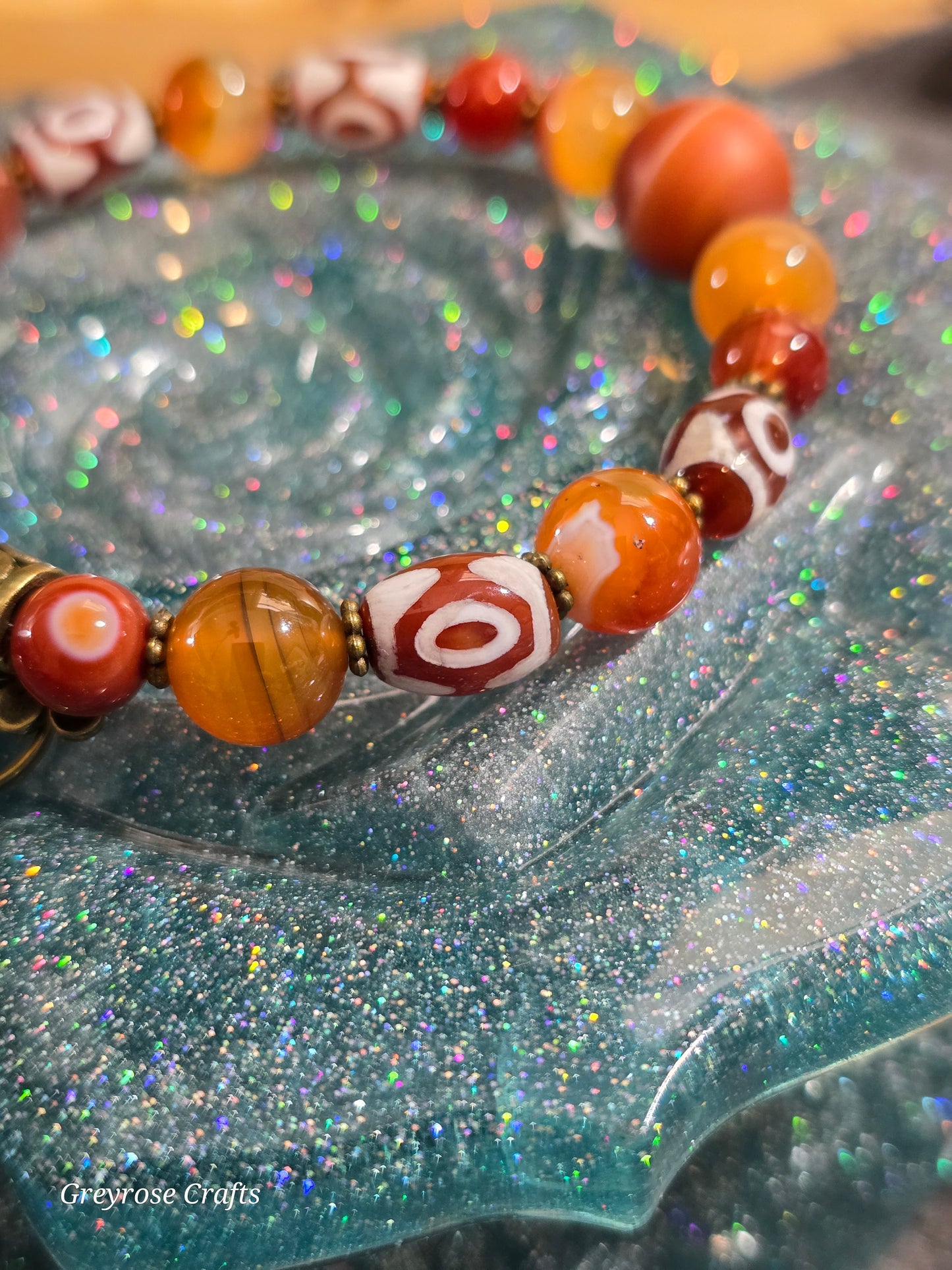 Carnelian Crystal Bangle Bracelet featuring painted beads with Heart Clasp and Beaded Extension