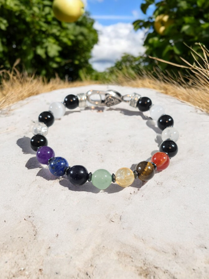 Natural Crystal  Chakra Bracelet. Carnelian. Tiger Eye. Citrine. Green aventurine. Sodalite. Lapis Lazuli. Amethyst. Clear crackle quartz and Selenite.  Silver Alloy Metal with Heart Clasp.