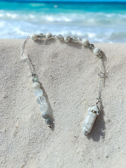 Howlite, Labradorite, selenite and clear quartz crystal pendulum with beaded chain.