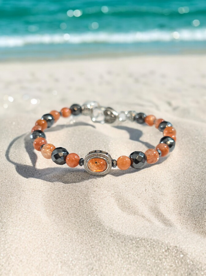 Sunstone and Hematite Treasure Box Bangle Bracelet with Heart Clasp.  Fits up to size 7.75" wrist.