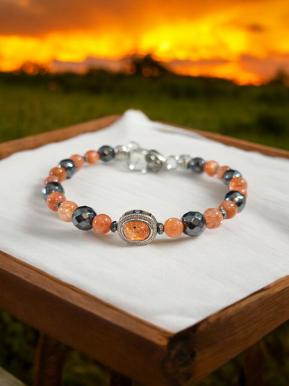 Sunstone and Hematite Treasure Box Bangle Bracelet with Heart Clasp.  Fits up to size 7.75" wrist.