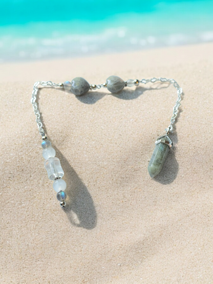 Labradorite, selenite and clear quartz crystal pendulum with beaded chain.