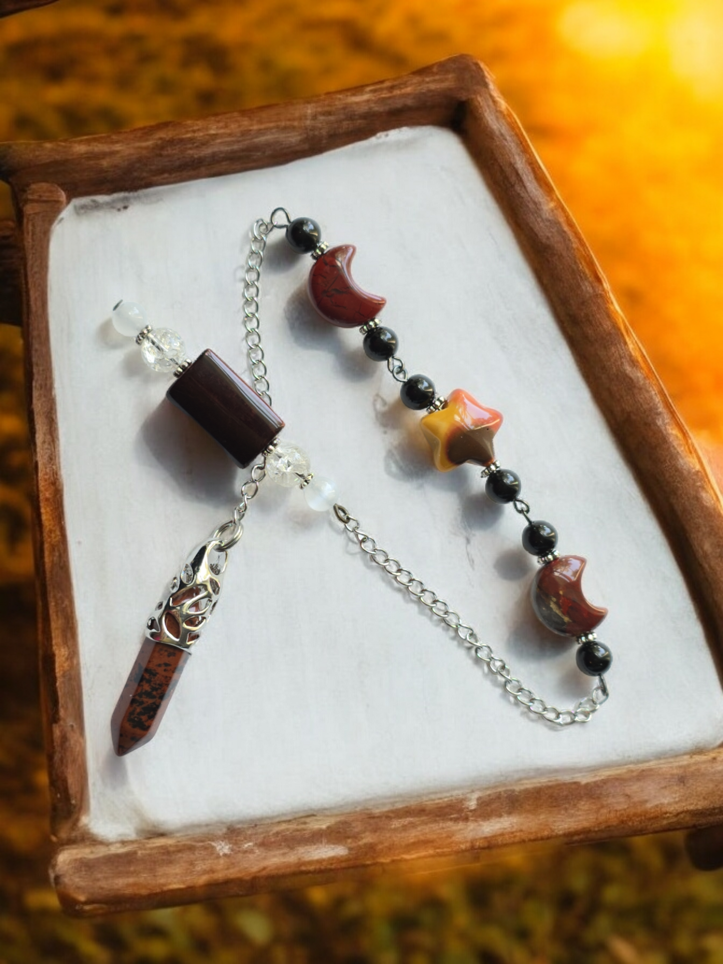 Mahogany Obsidian, Red Tiger Eye, Mookaite, and Red Braciated Jasper with Clear Quartz and Selenite crystal pendulum with beaded chain.